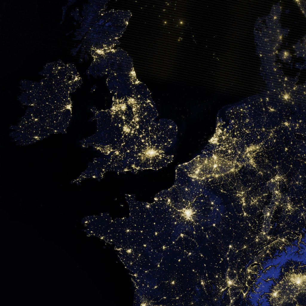 Satellite image of southern England at night showing lights and population